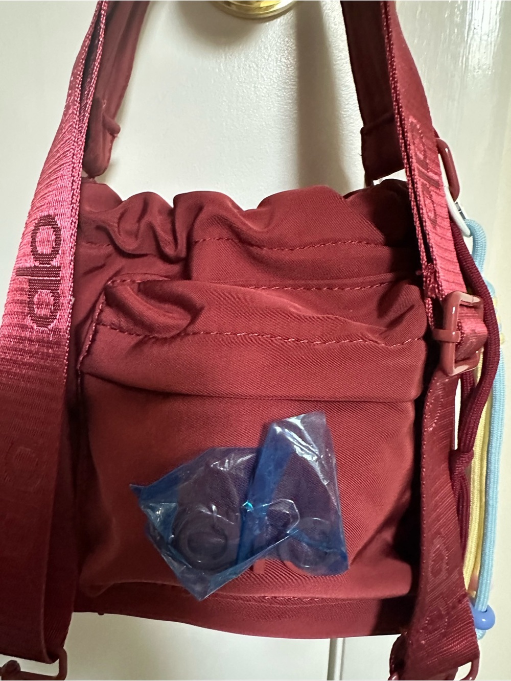 Alo..Everyday Crossbody Bucket Bag in Deep Wine